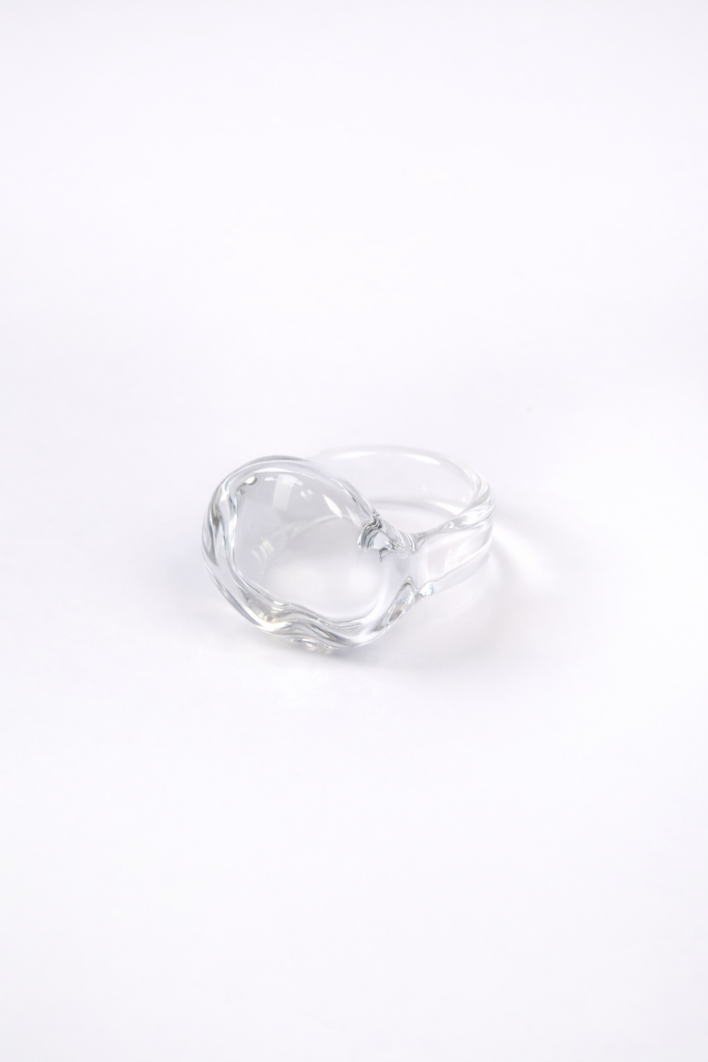 Handmade borosilicate glass amorphous ring in clear by AIROKAD STUDIO. 