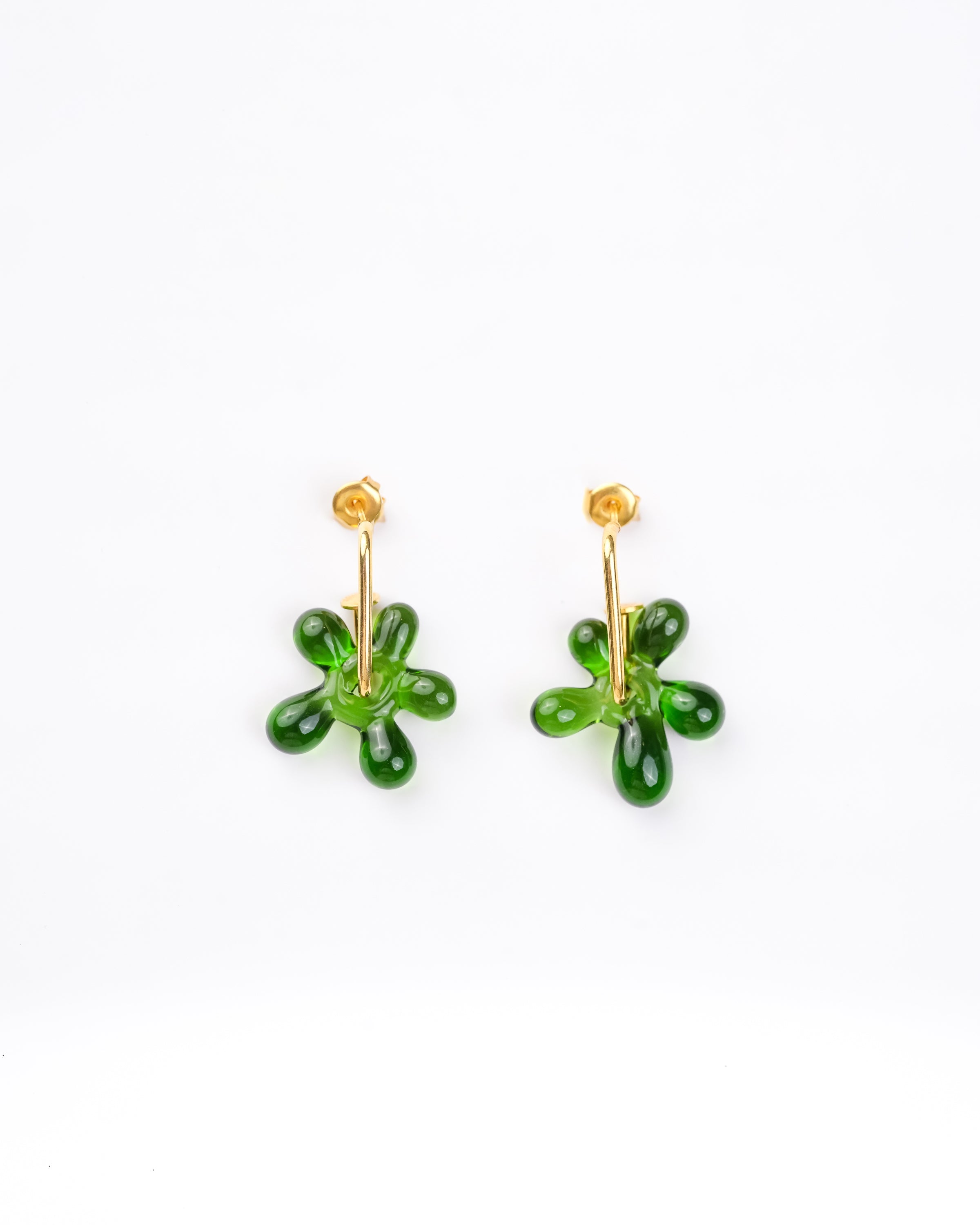 Handcrafted borosilicate glass flower shaped hoops in green by AIROKAD STUDIO.
