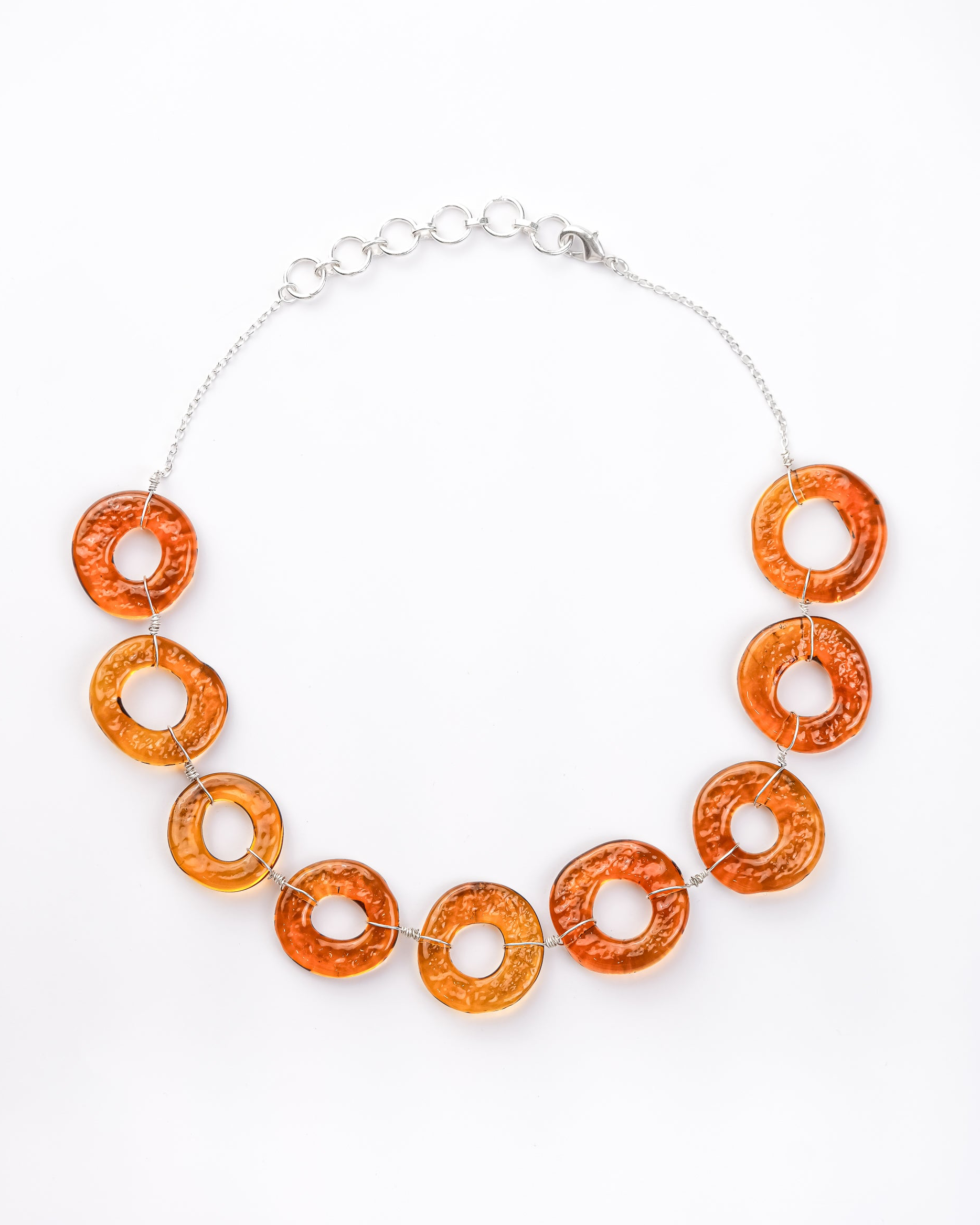 Handmade borosilicate glass brown hollow circle choker by AIROKAD STUDIO.