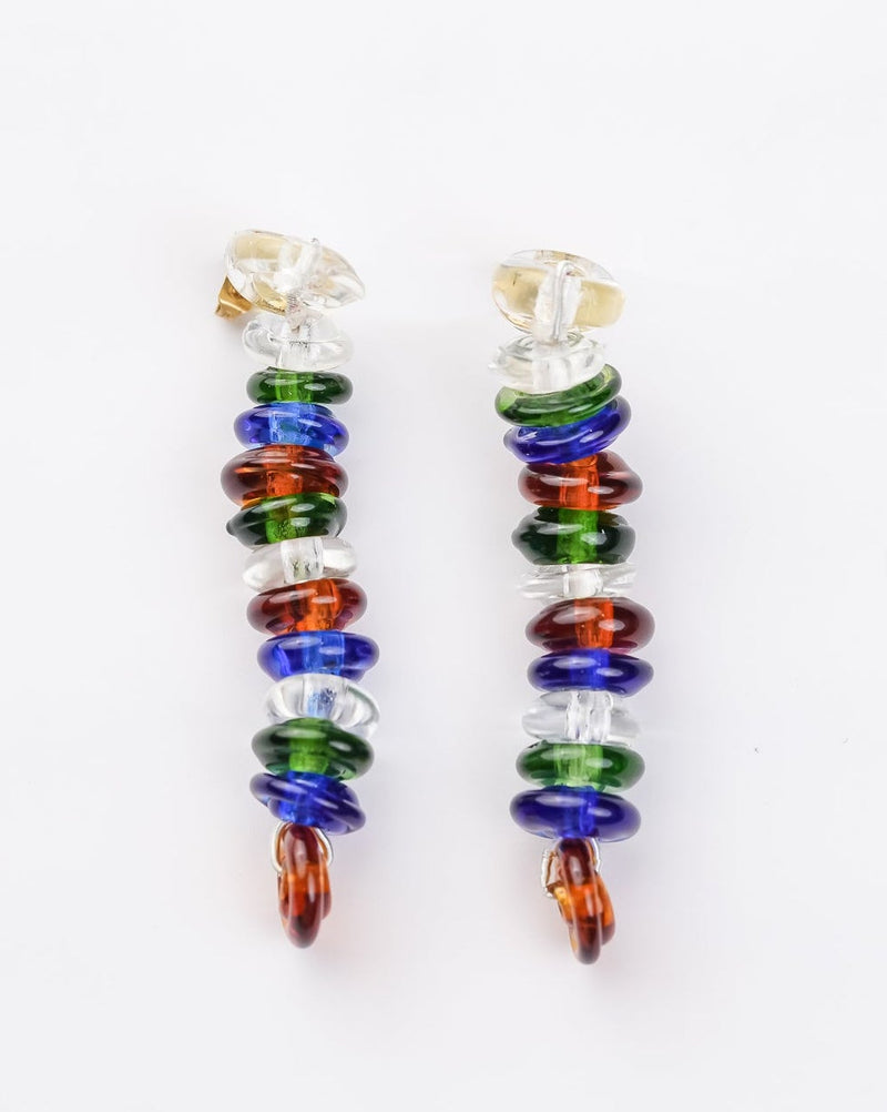 Pair of colorful beaded earrings on a white background