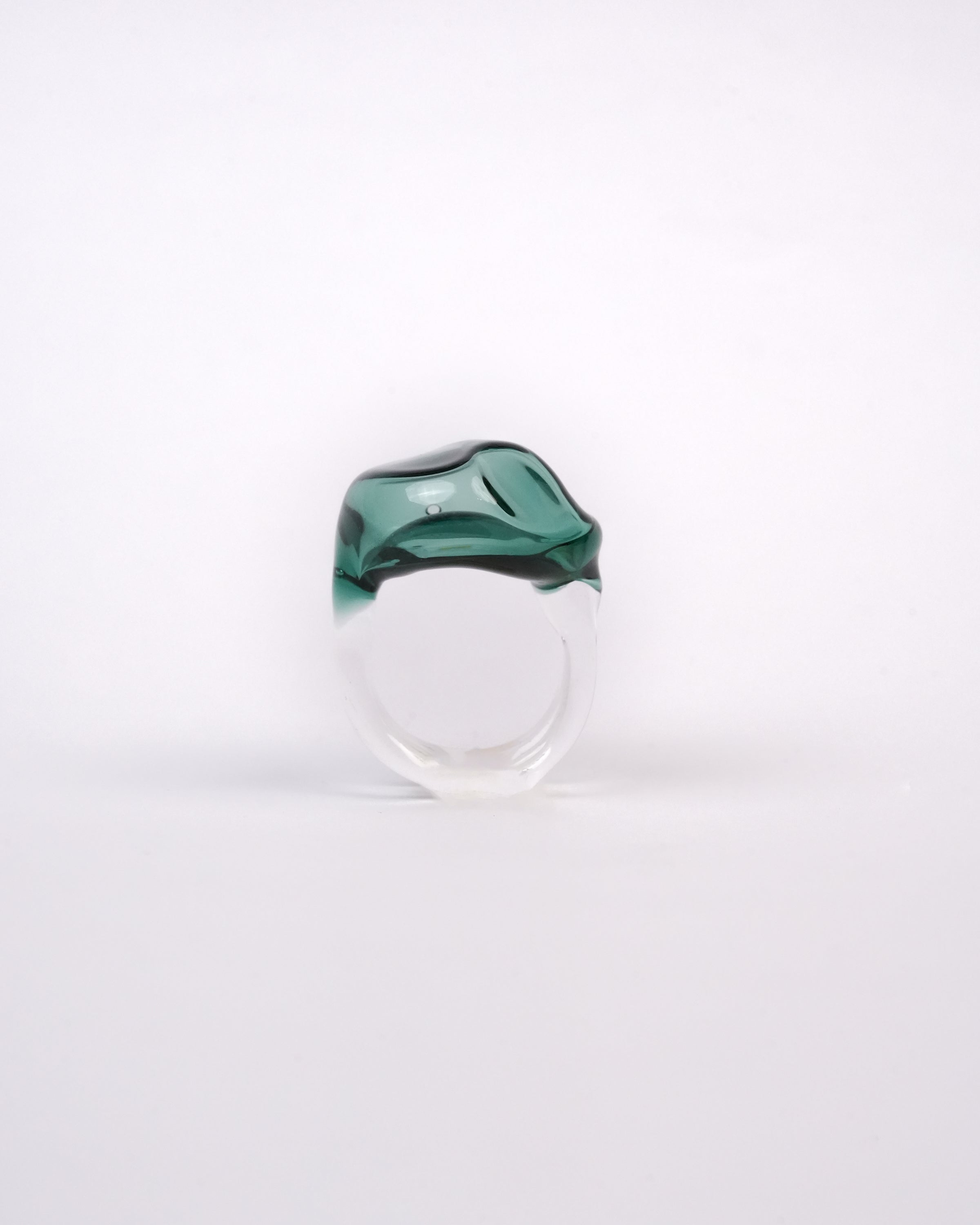 Handmade borosilicate glass amorphous ring in teal by AIROKAD STUDIO.