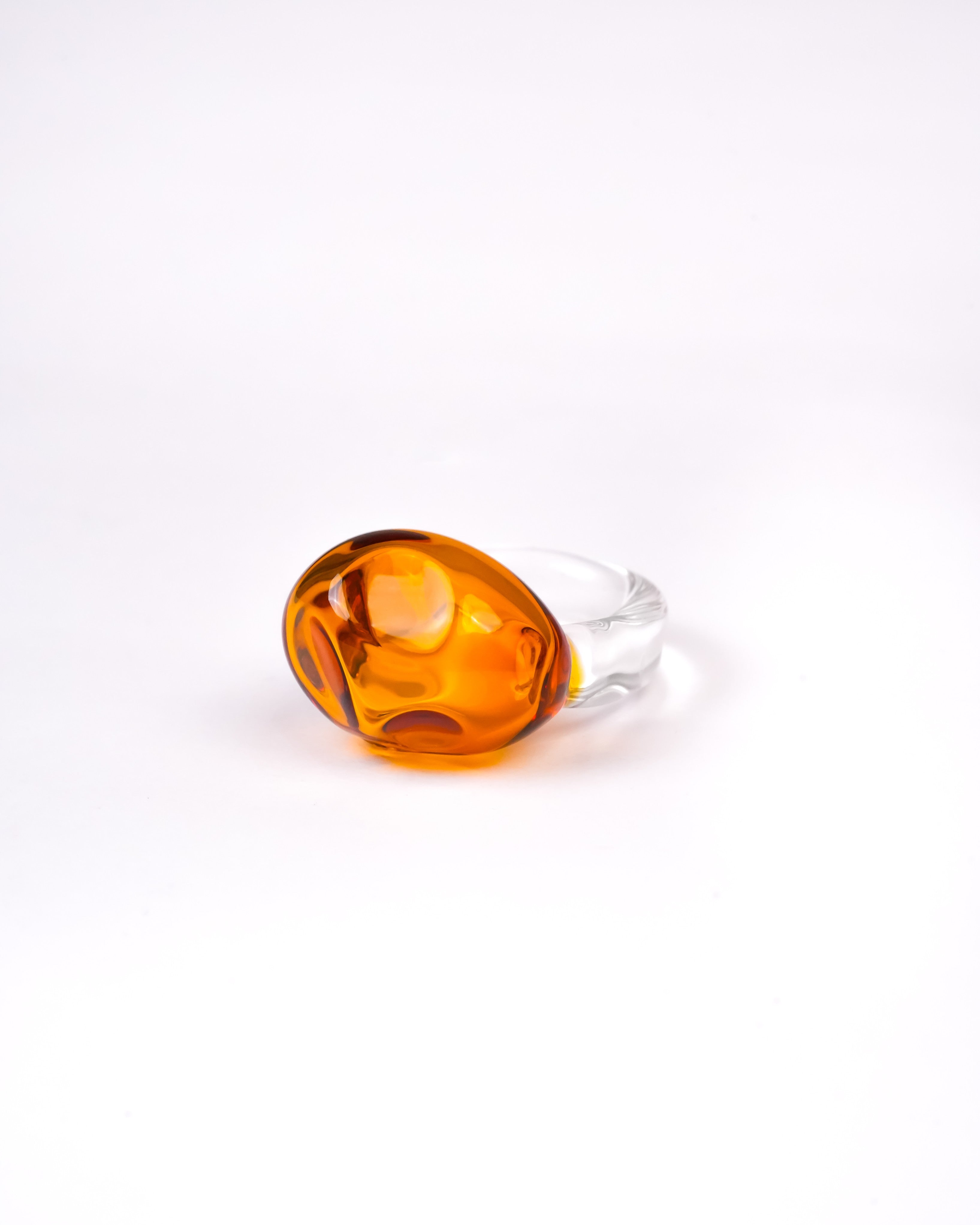 Handmade borosilicate glass amorphous ring in amber by AIROKAD STUDIO.
