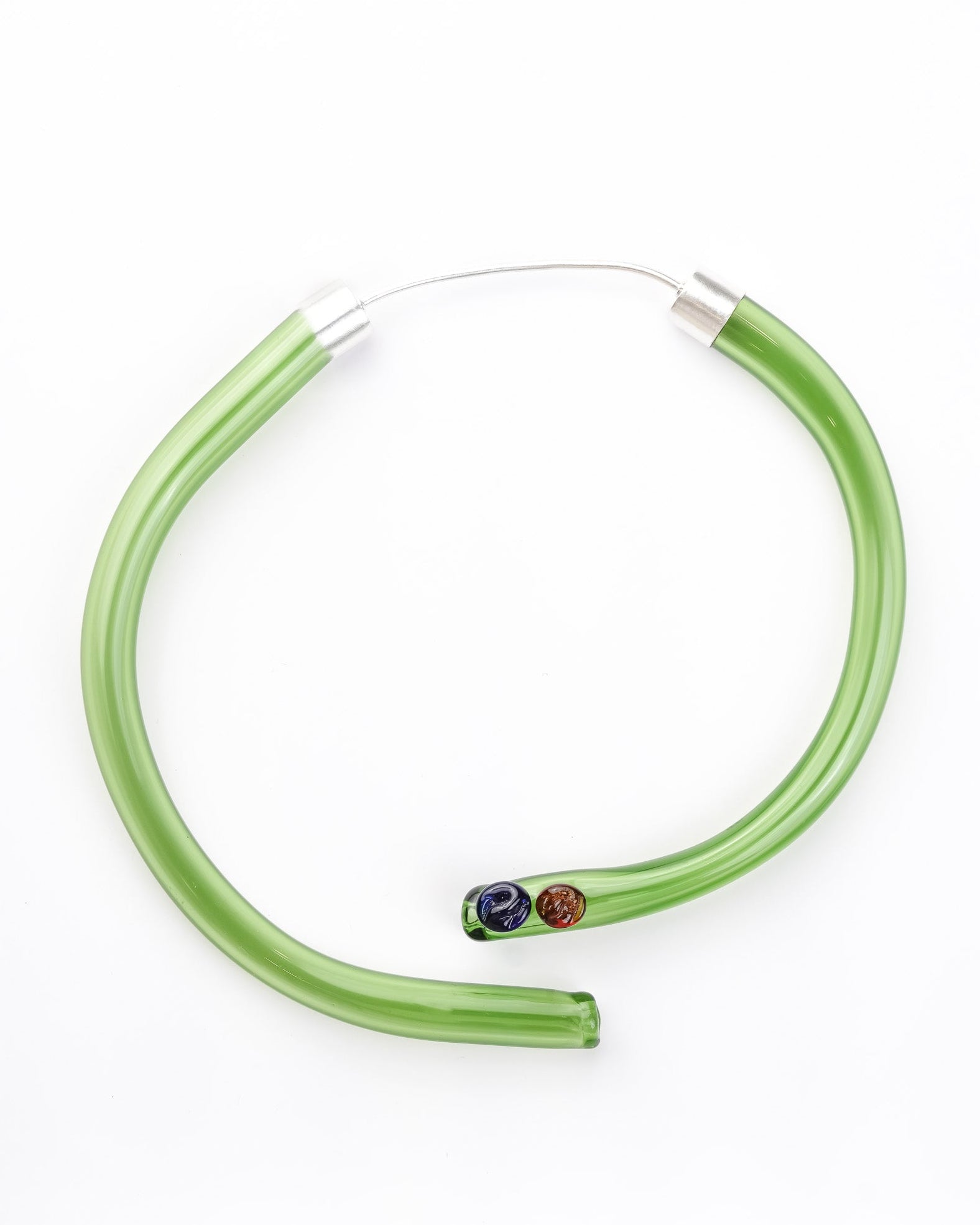Handcrafted borosilicate glass choker in green, tube shaped with brass hasli and rose detailing.