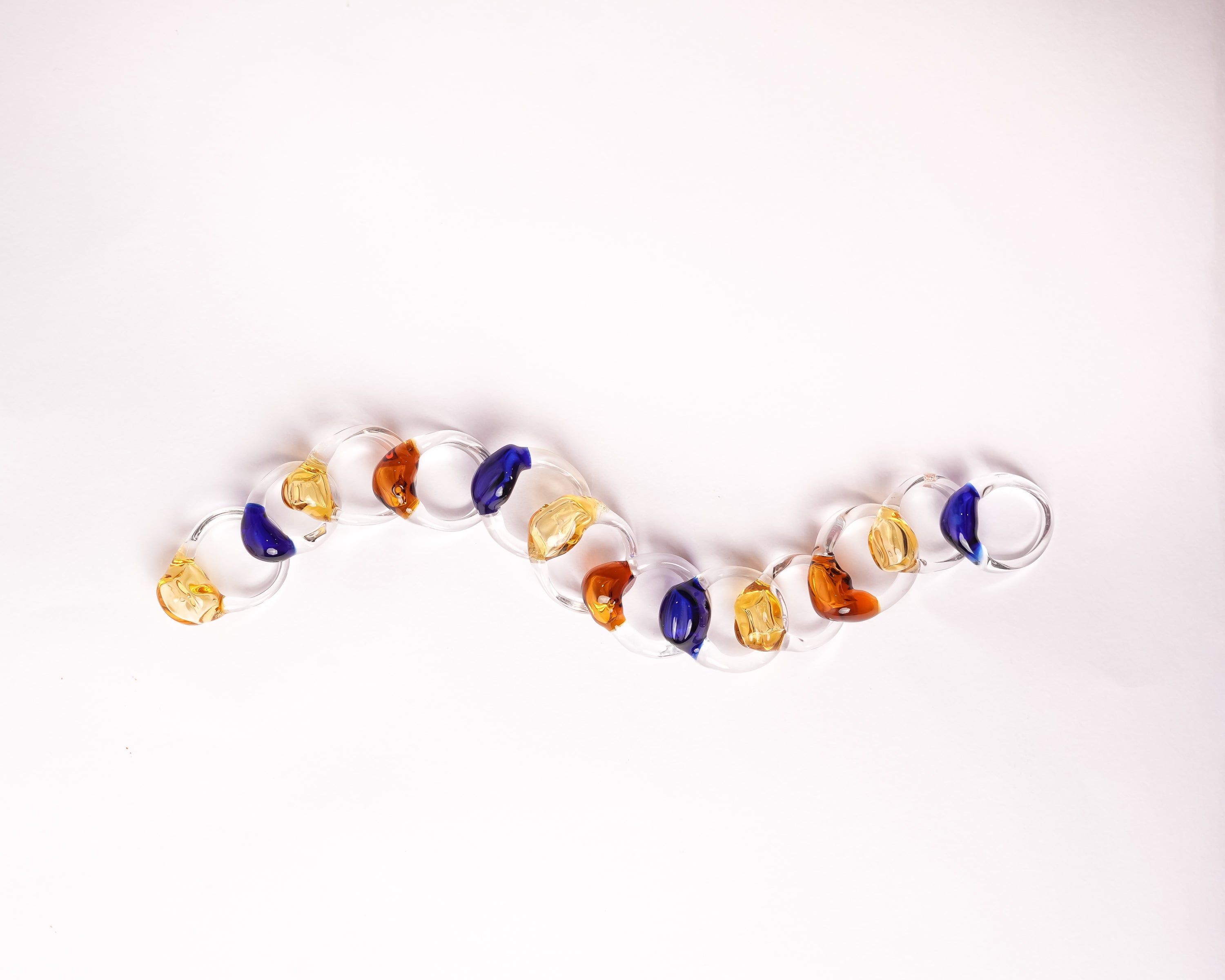 Handcrafted borosilicate glass rings rocks of gibraltar in colors blue, amber and yellow by AIROKAD STUDIO.