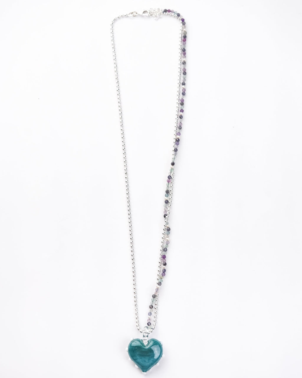 multicolor bead and brass chain with handcrafted heart shaped blue borosilicated glass pendant by AIROKAD STUDIO.